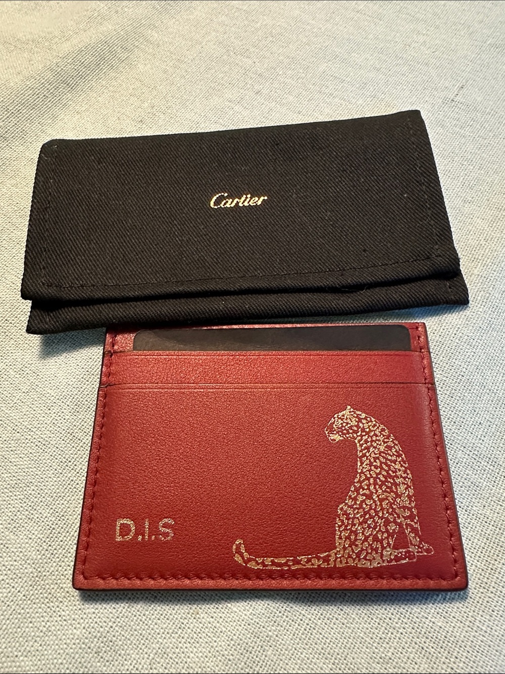 Cartier Red Leather Card Sleeve with Gold Leopard Detail with a dust bag